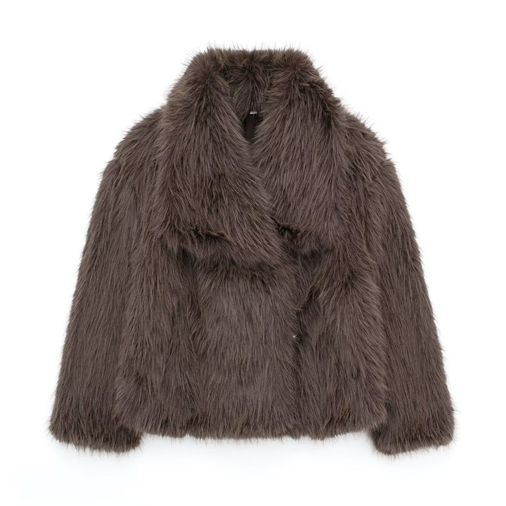 Woman in cropped fluffy faux fur jacket