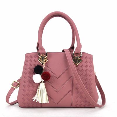 Embossed top handle handbag with pompom