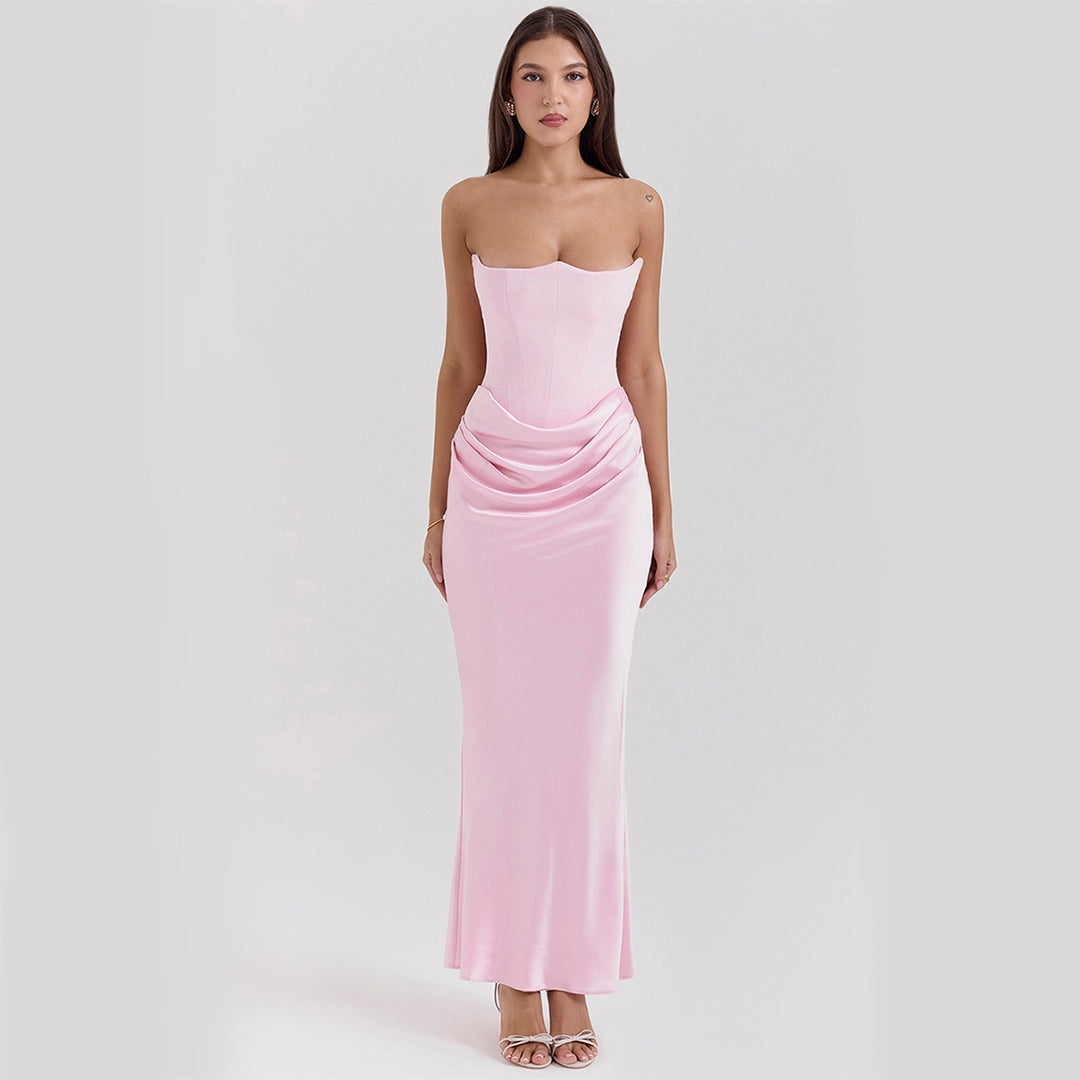 Woman in a strapless satin maxi dress
