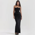Woman in a strapless satin maxi dress