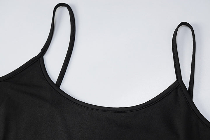 Woman in black bodycon maxi dress