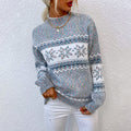 Woman in snowflake knitted Christmas jumper