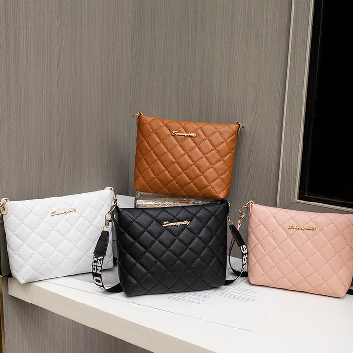 Small quilted crossbody bag with wide strap