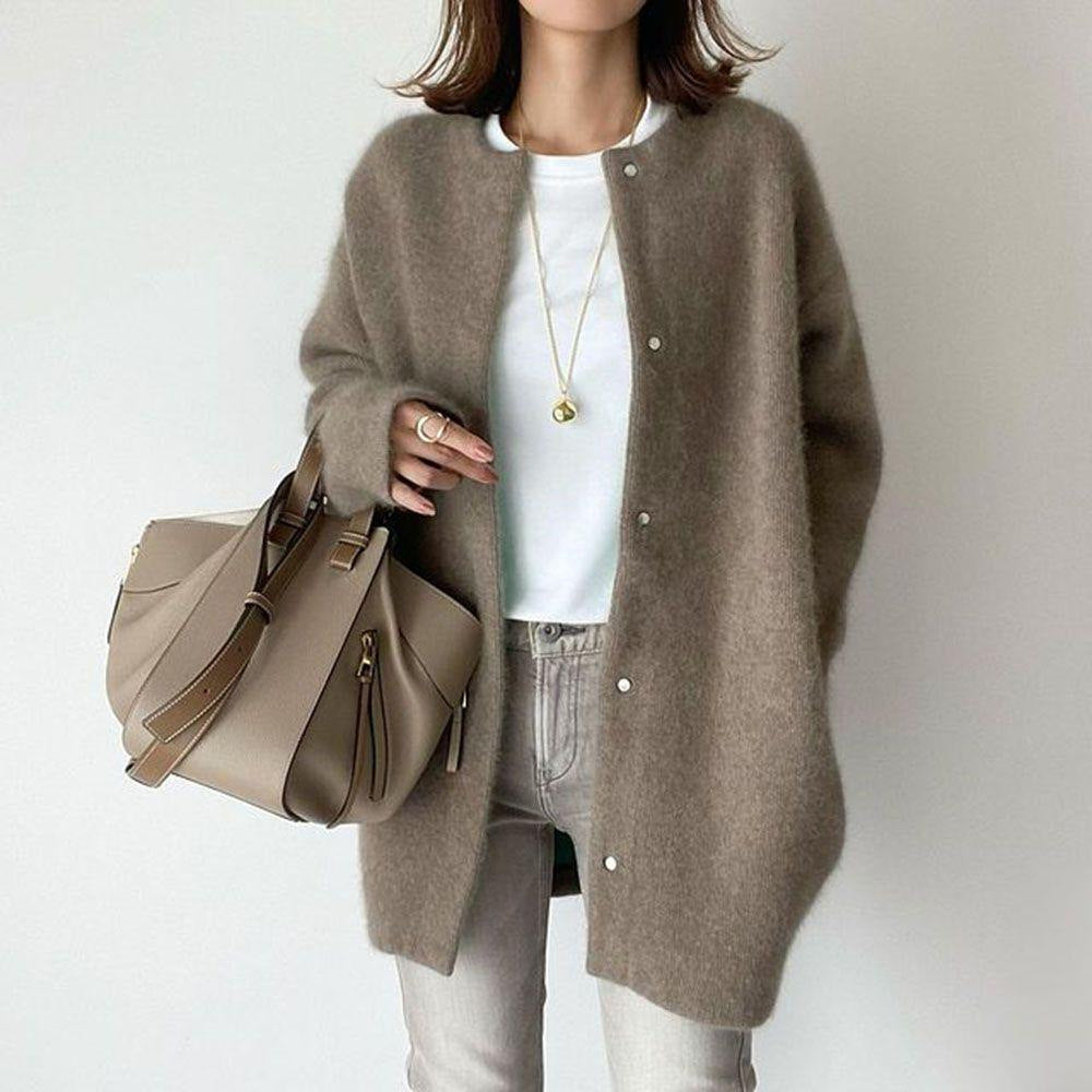 Woman in long fuzzy knit cardigan
