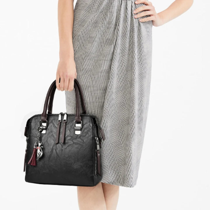 Vintage faux leather handbag with tassel