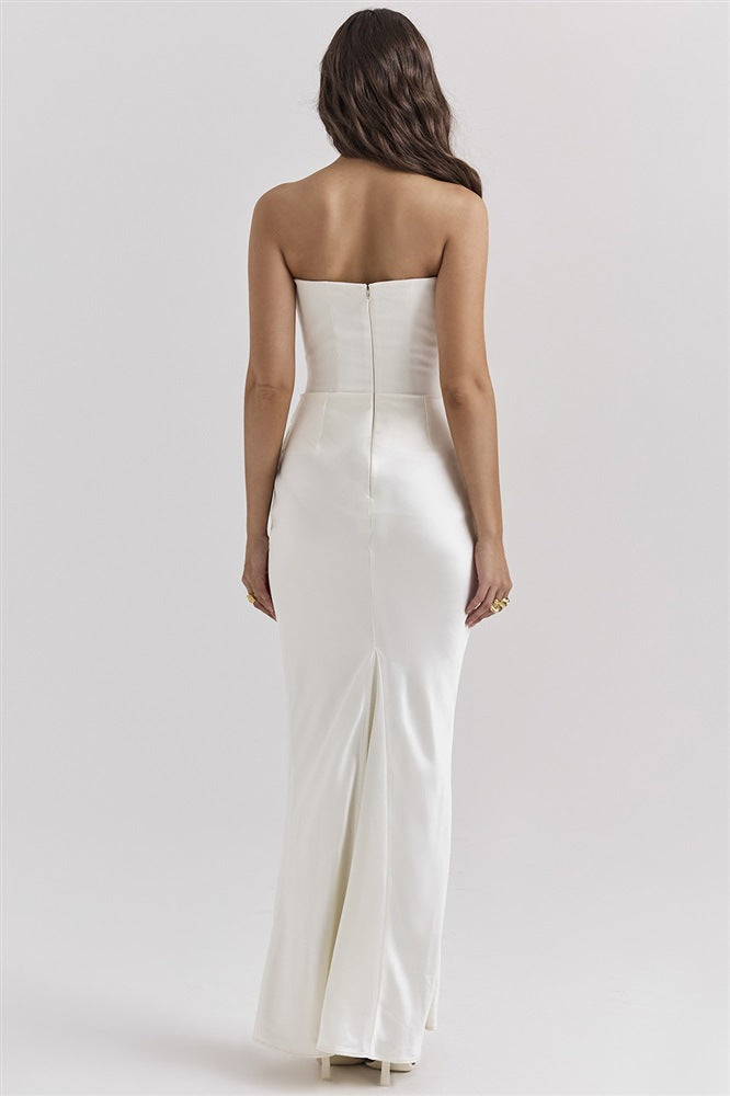 Woman in a strapless satin maxi dress