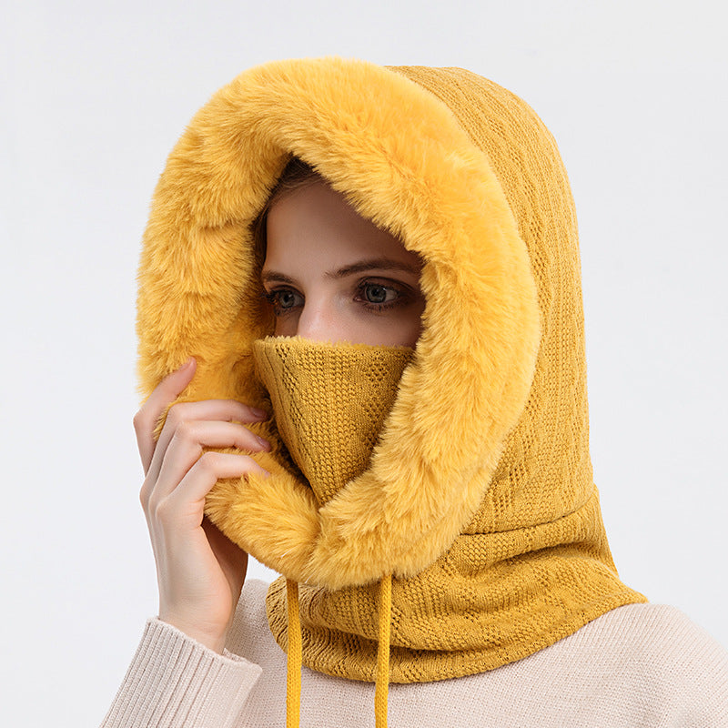 Knitted hood with faux fur trim