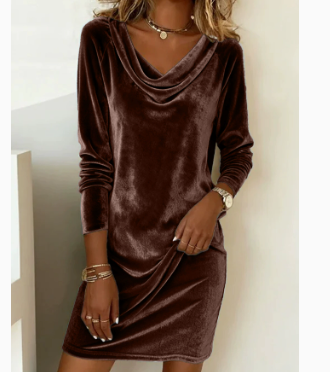 Woman in a velvet cowl-neck mini dress